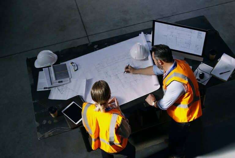 designers-discussing-architectural-plans-from-above-992x653px-768x517-min (1)